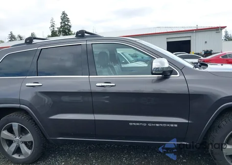 2014 Jeep Grand Cherokee Overland z USA, uszkodzony, nr VIN 1C4RJFCMXEC417525